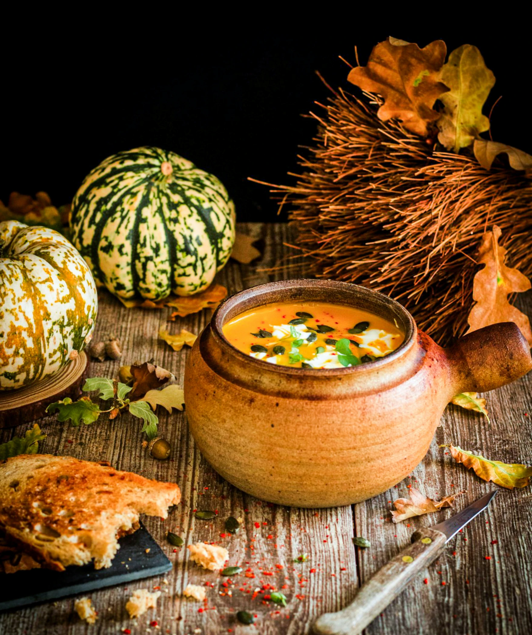 soup is on the table next to vegetables