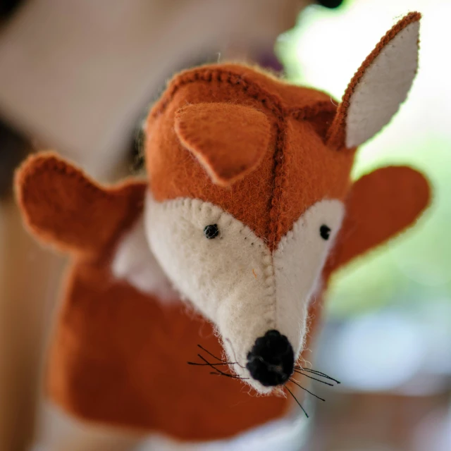 there is a stuffed fox on the head