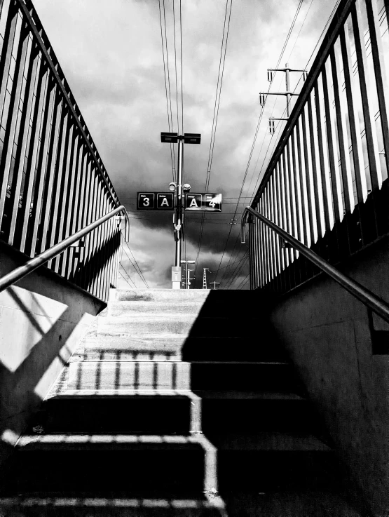 a staircase with a traffic signal on top of it