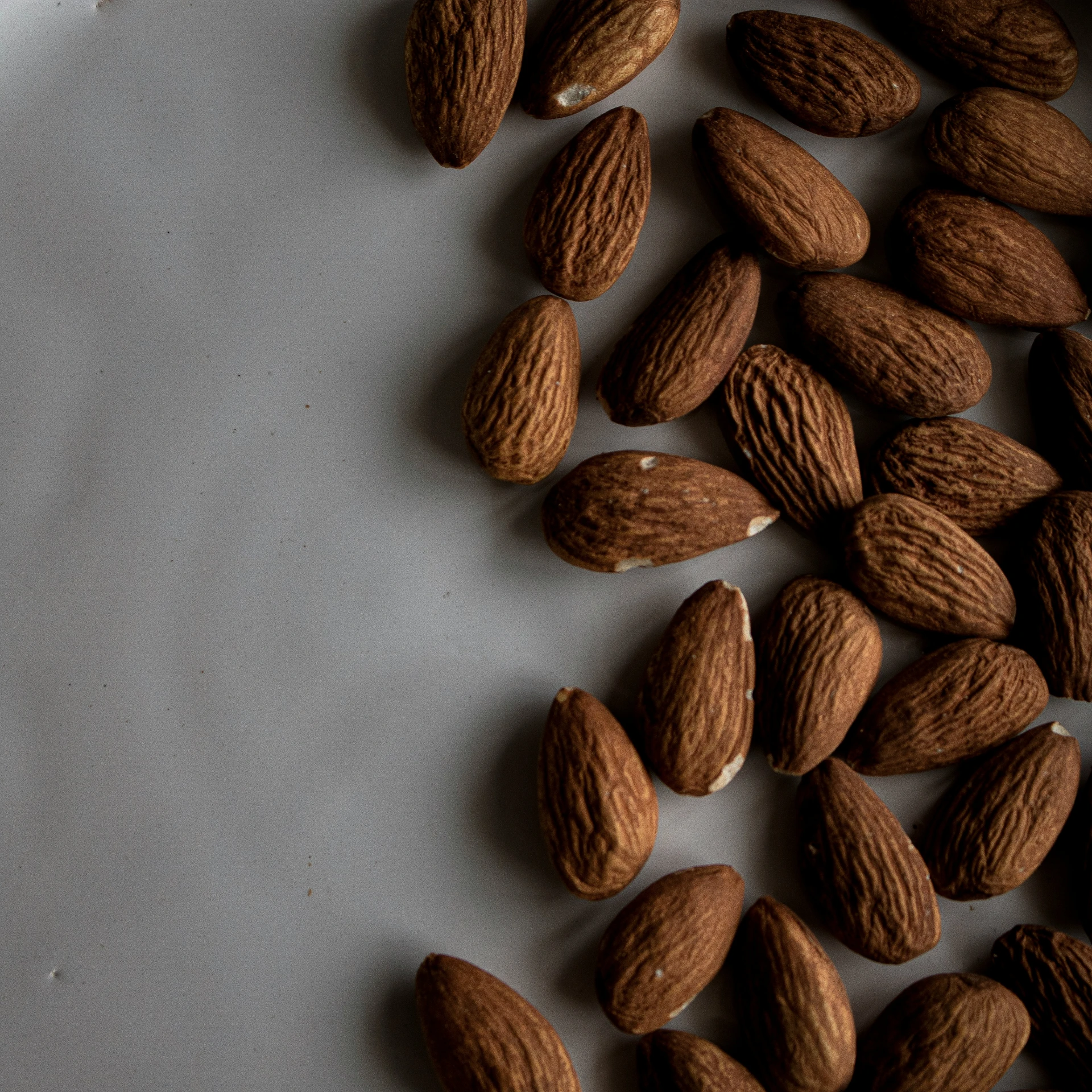 almonds with dark brown kernels on top