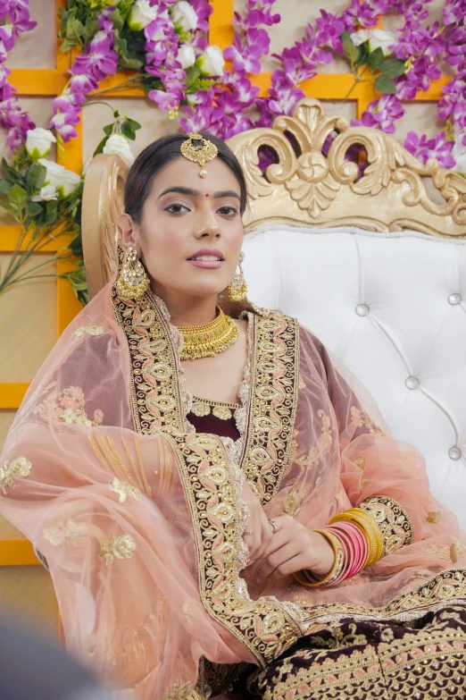 a young indian bride in traditional bridal outfit