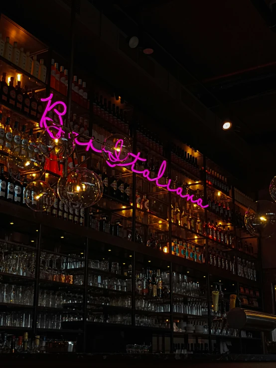 a bar with signs that read, be beautiful