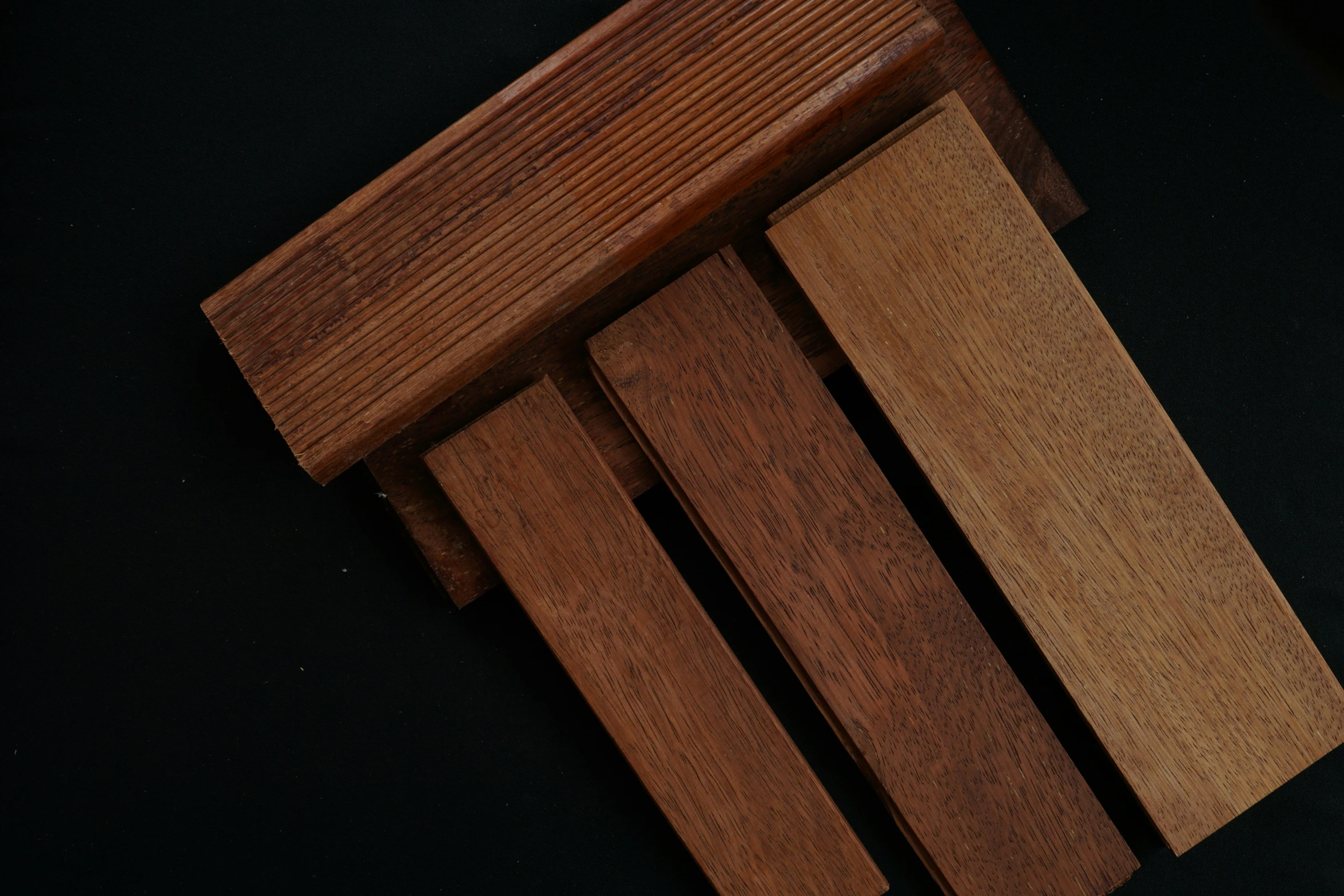 a close - up view of the side pieces of a wooden chair
