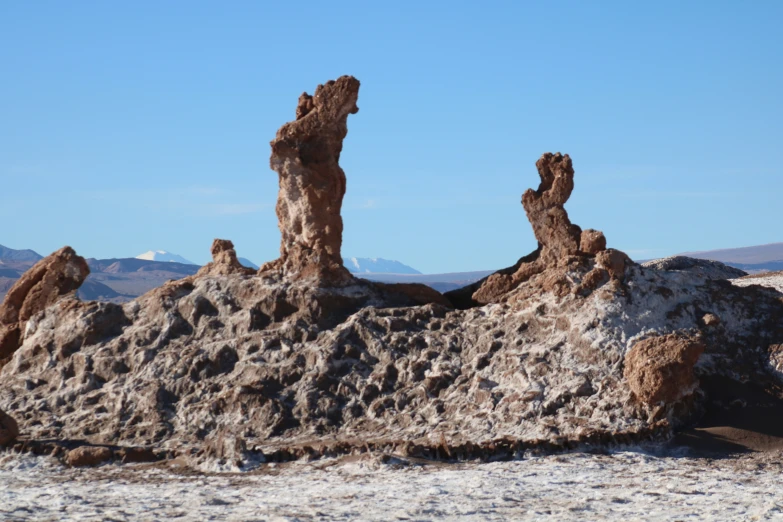 the rocks are piled high on each other