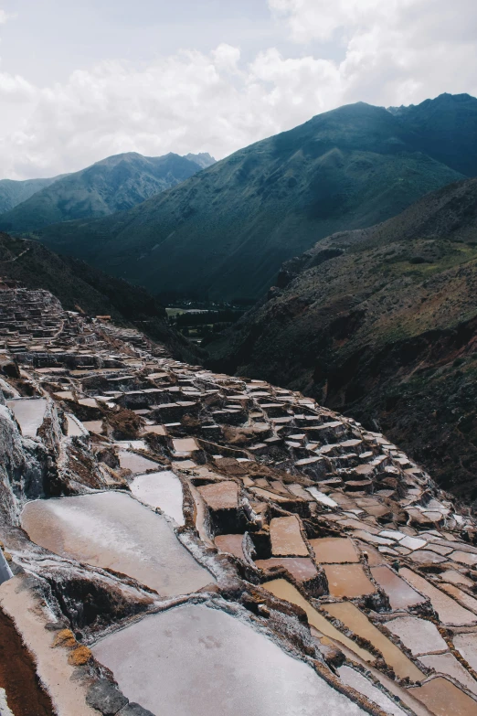 a large pile of concrete standing on top of a mountain