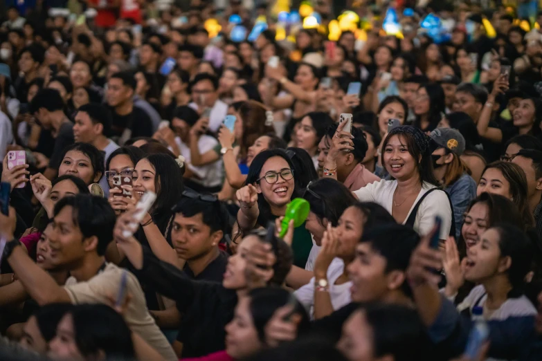 group of people smiling at soing while in the middle