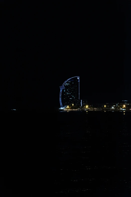 the view from a boat of a sailboat sailing in a lake