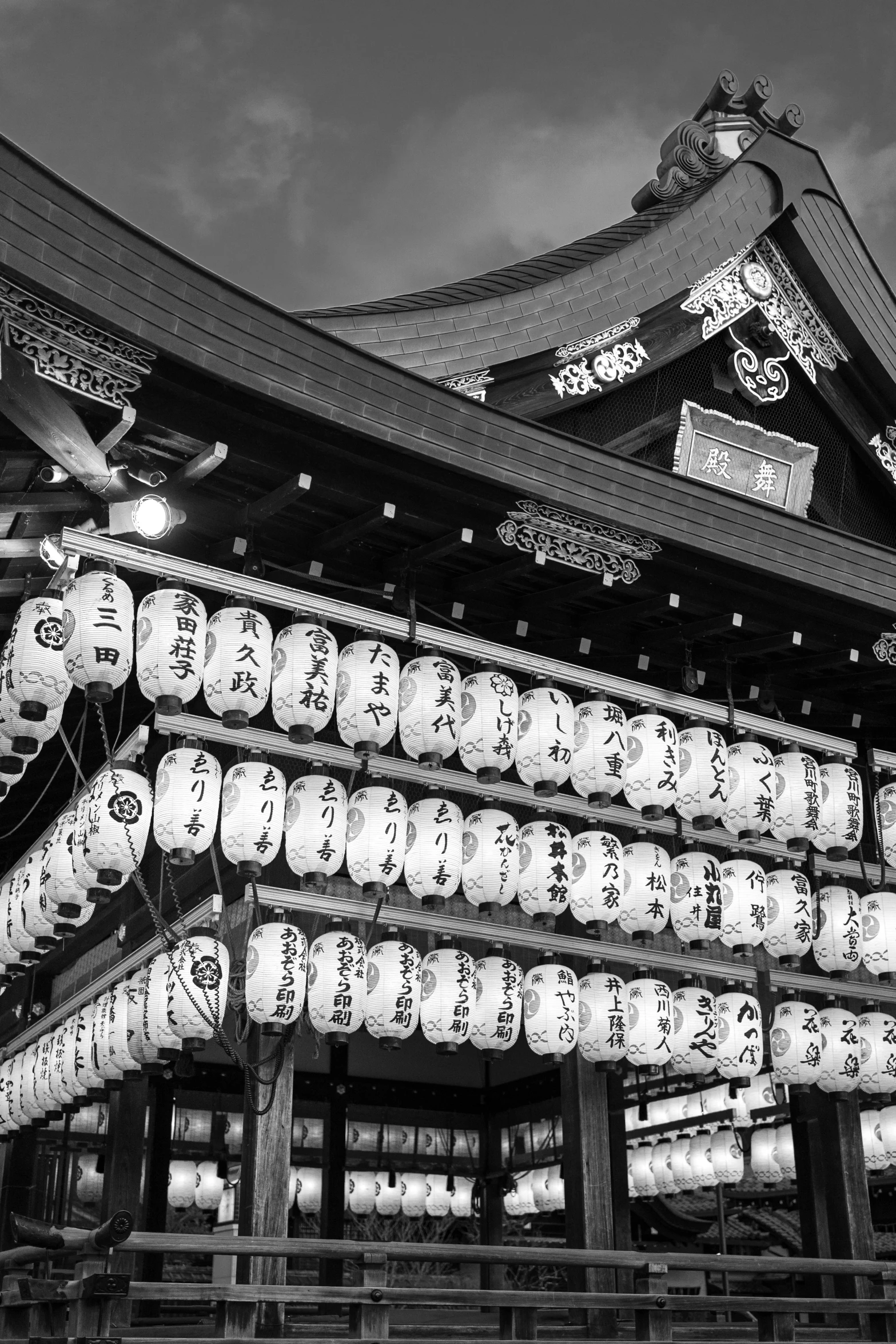 black and white pograph of an old temple at night