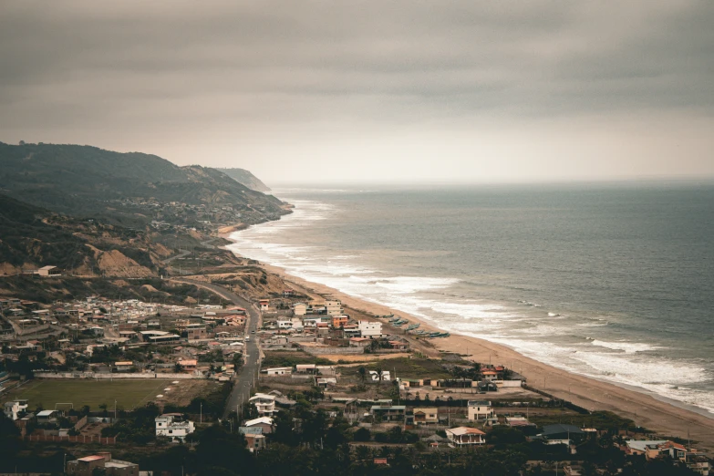 houses next to the beach in a coastal town