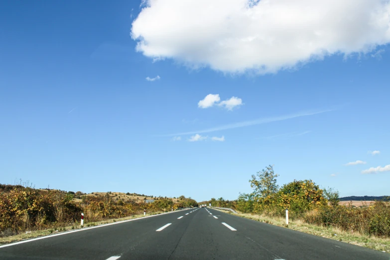 a view of the sky from inside the car