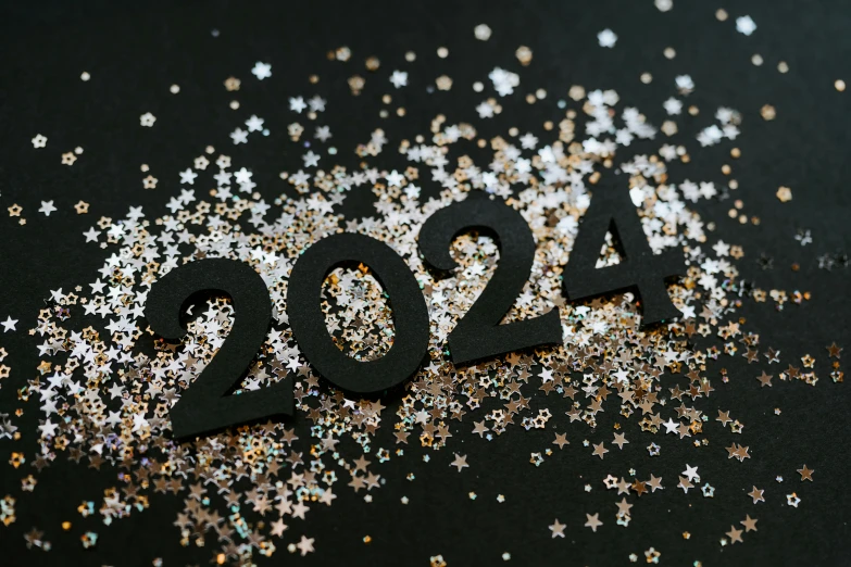an image of the numbers 4204 spelled with golden and silver glitters