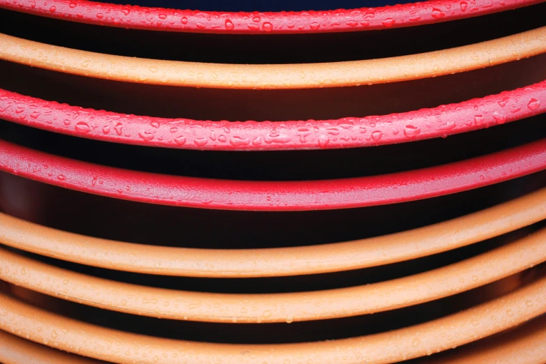 a close up of a stack of wood round