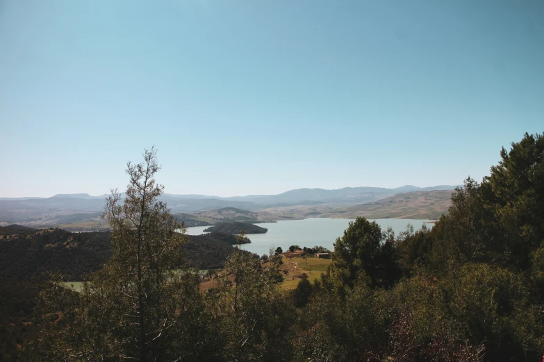 looking down on a lake and valley from an overlook point