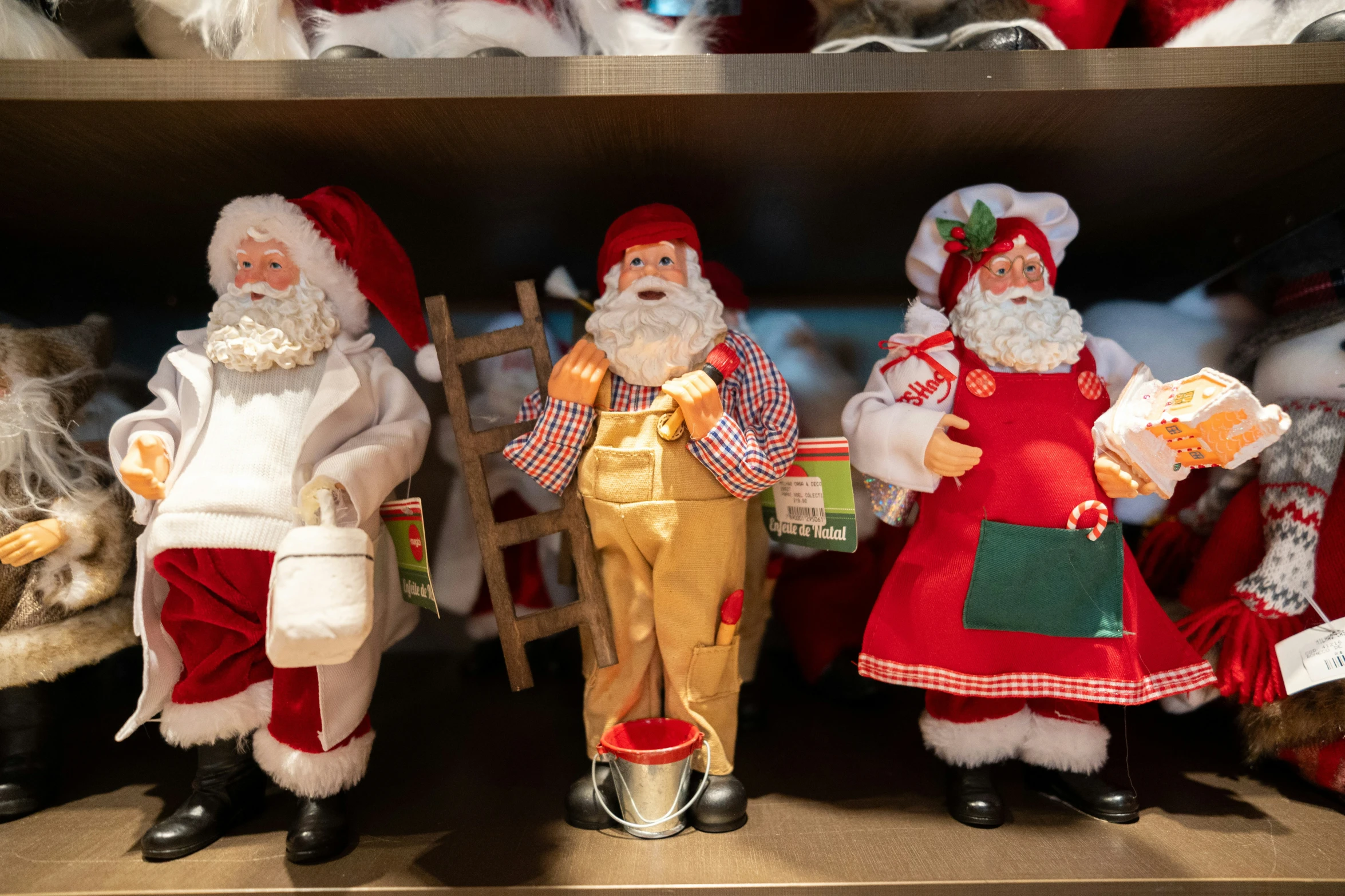 a close up of many figurines in a shelf