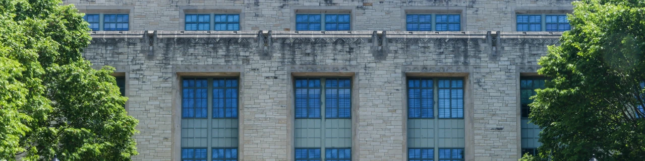 the windows of a building are all blue