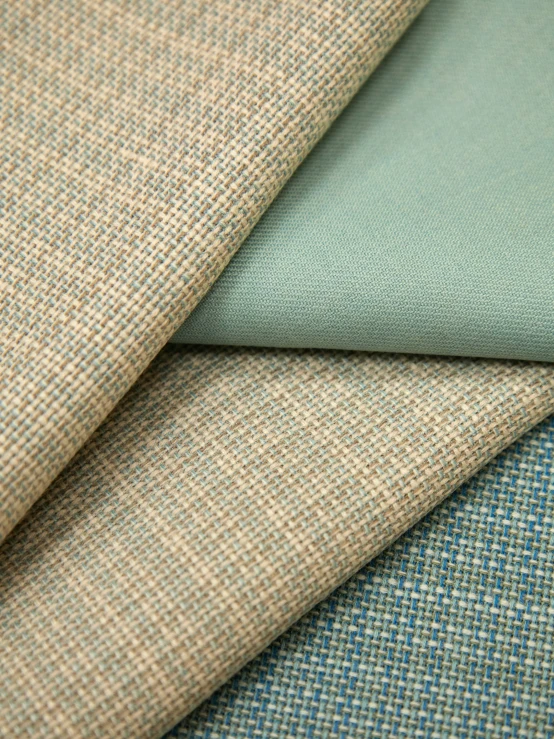 a few different colors of fabric on top of each other
