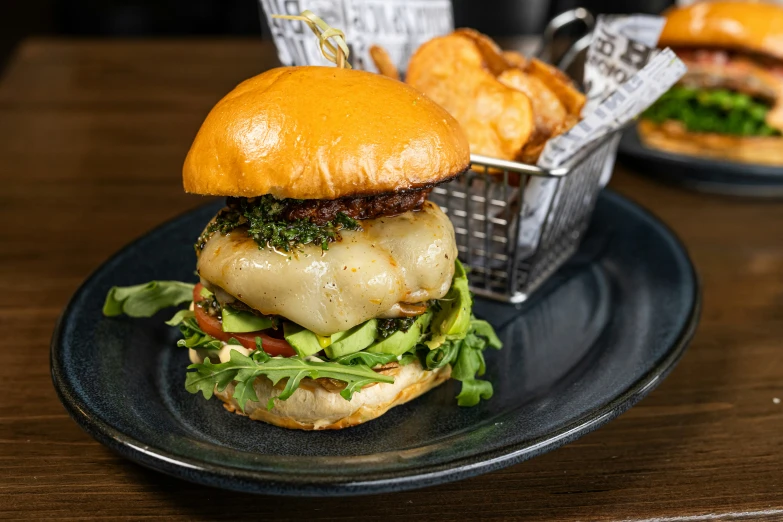 a close up of a plate with a sandwich