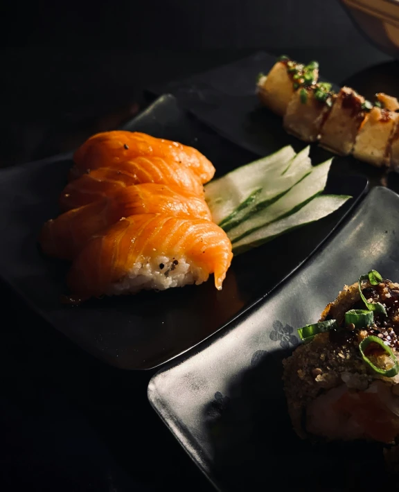 three small plates with different foods on them