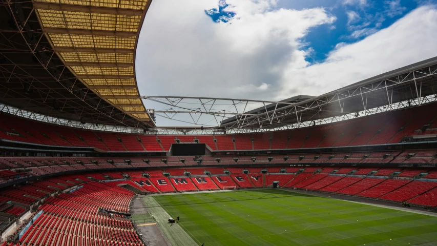 a soccer stadium, with an empty field and seating