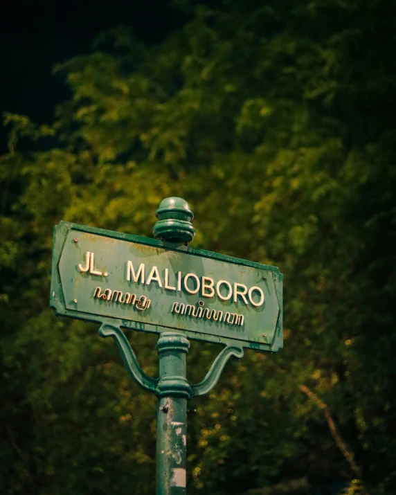 an old fashioned street sign for jl malloboro