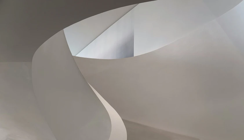 a room with circular structures that appear to be curved