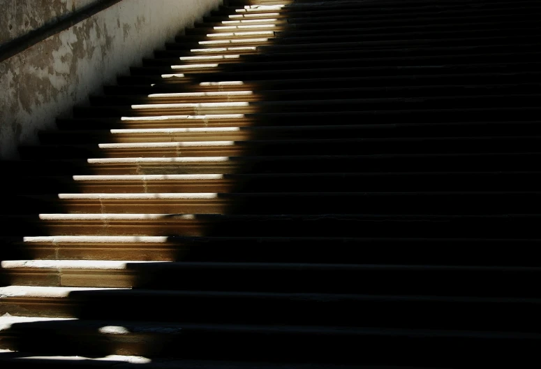 the shadows on the stairs are casting many shadows