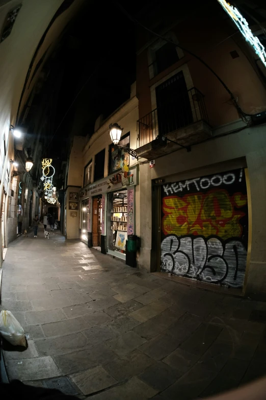 a view of an alley from the middle of the road