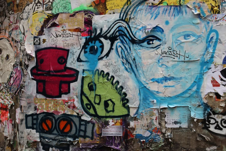 graffiti and various objects on a wall