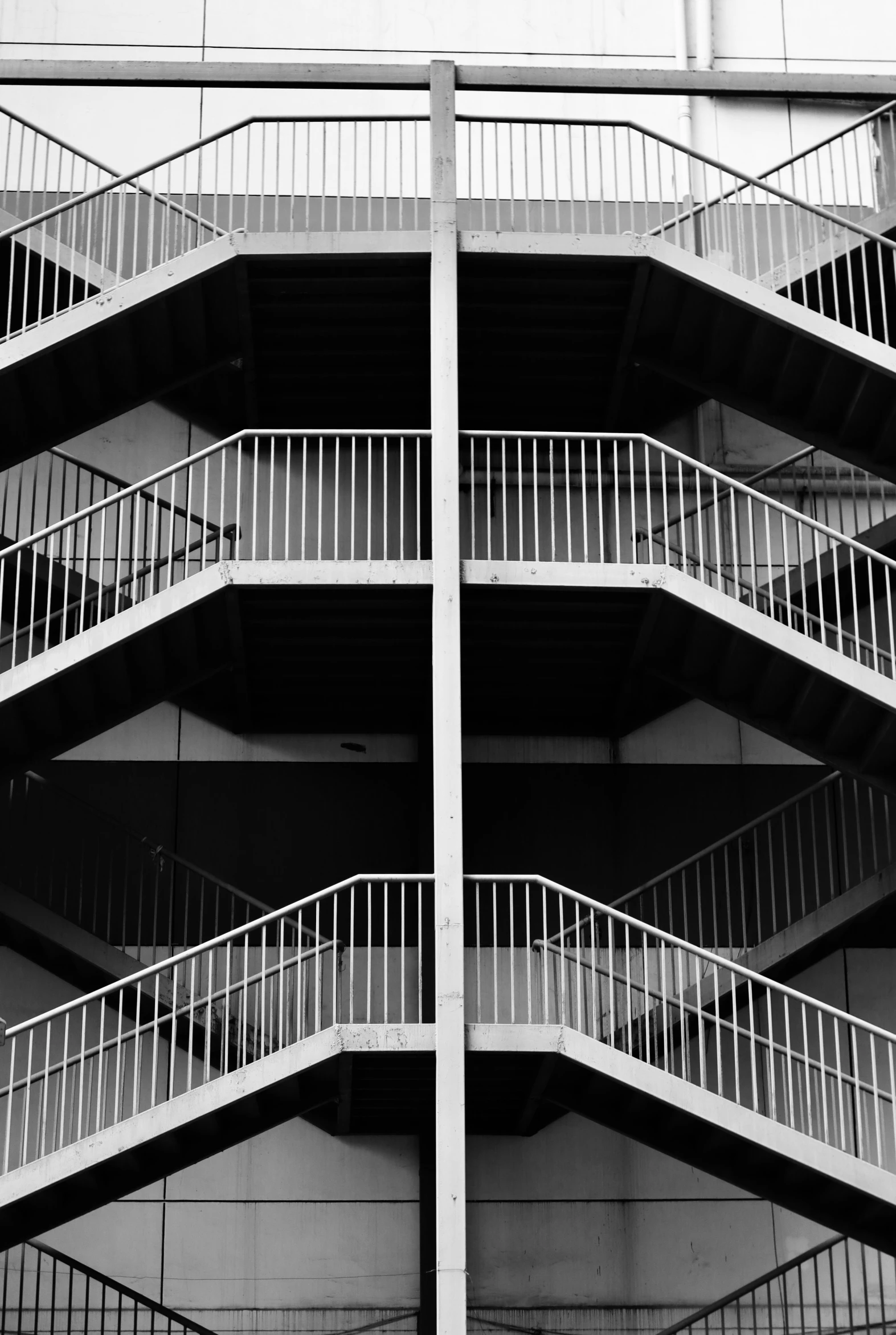 some sort of stairs outside a very high building