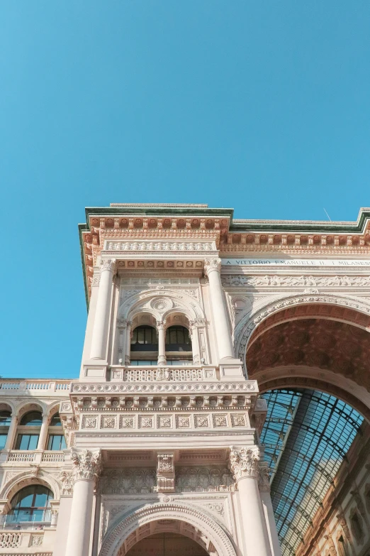 the architectural entrance to the building is tall