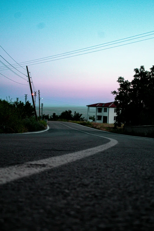 a stop sign and some wires in the sky