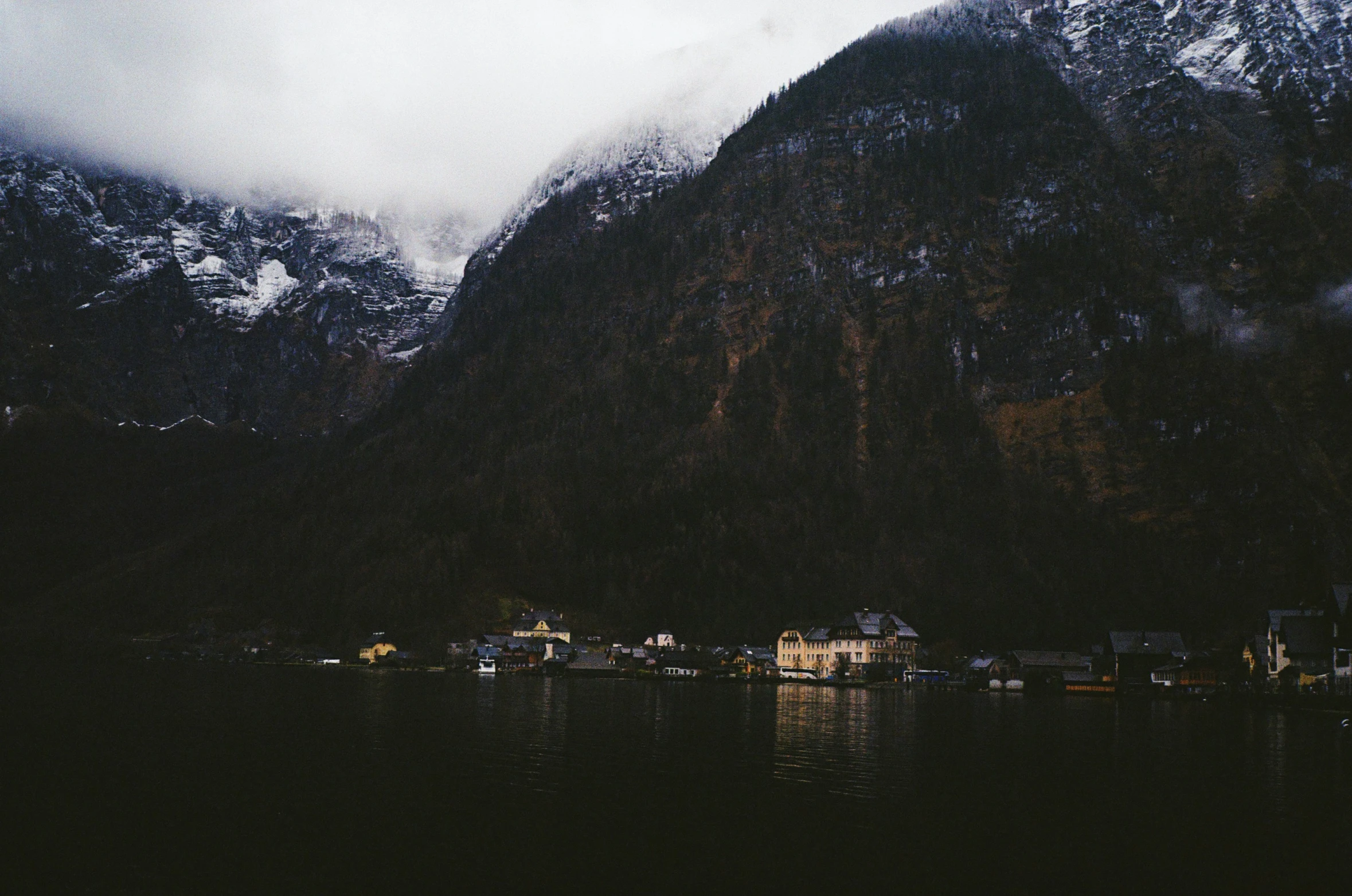 the mountains are covered with snow in the night