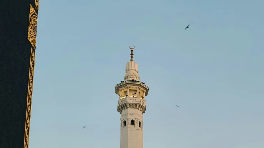 there is a tall building with a bell tower