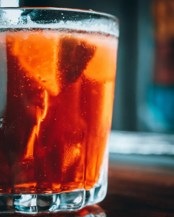 a close up of a glass with alcohol