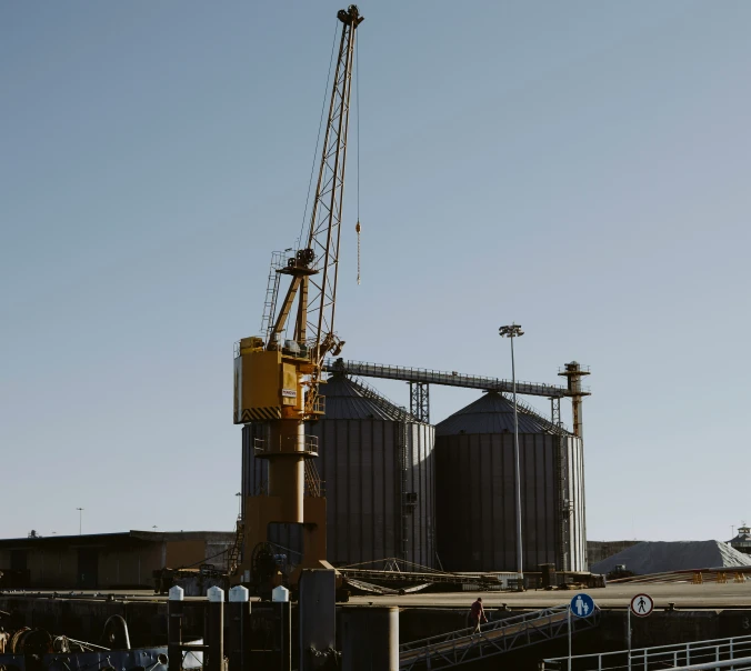 a crane is on top of some construction