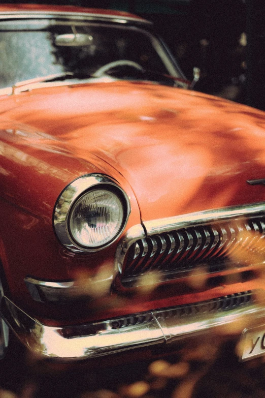 the old classic cars are parked outside of the building