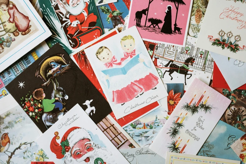 many christmas cards and drawings have been arranged together