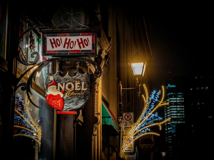 an illuminated lighted sign on the side of a building