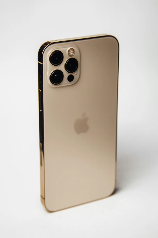 the back side of a golden iphone with its display on open