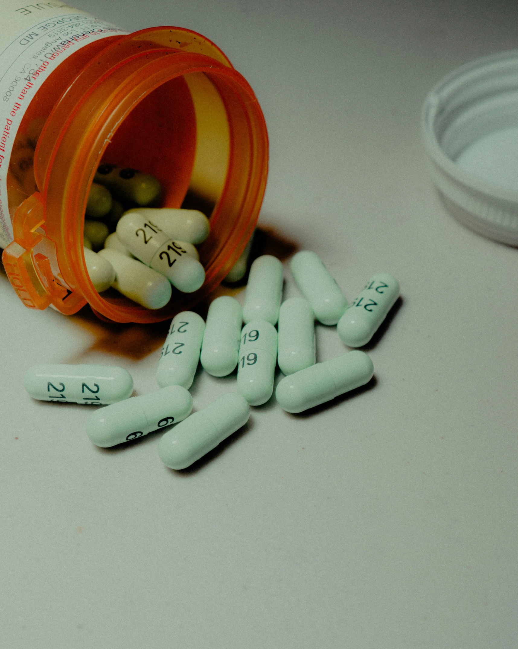 a jar of pills that are laying on a table