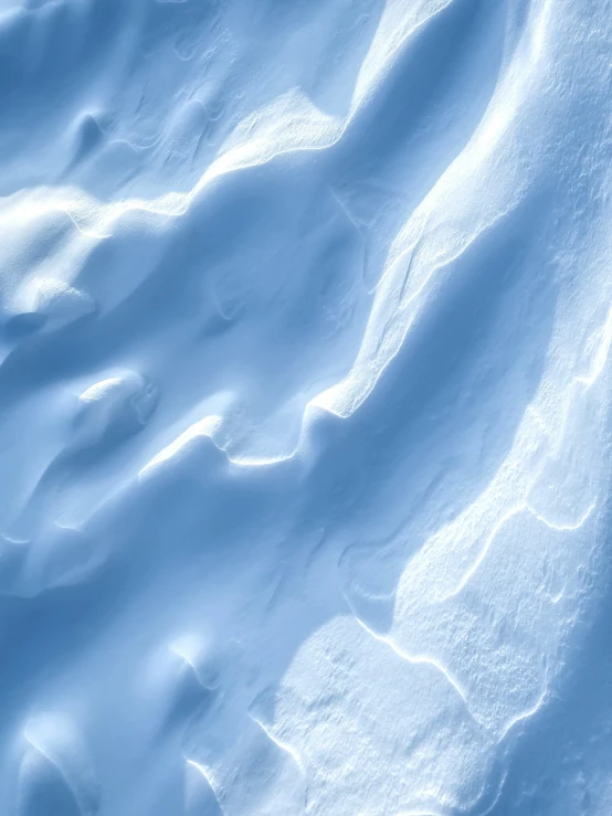 an image of a white snow and mountains