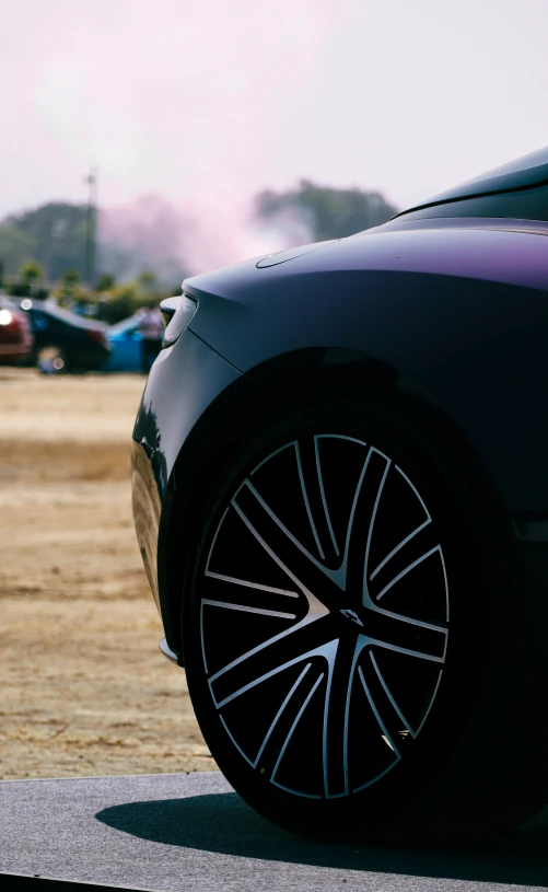 a close - up of the wheels of a modern car