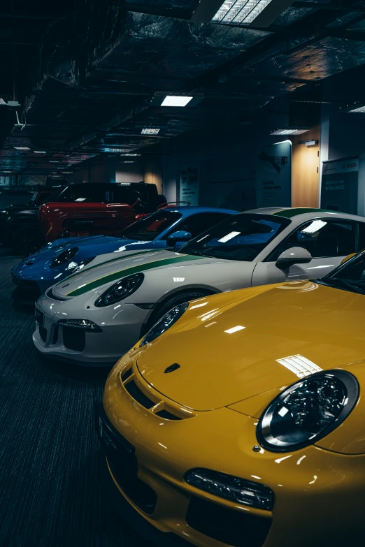 a row of sports cars are on display