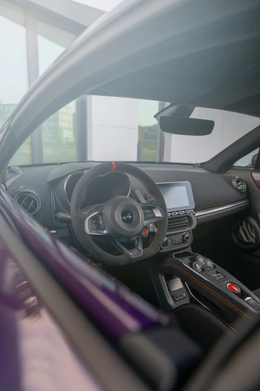 the interior of a vehicle with several things in the car