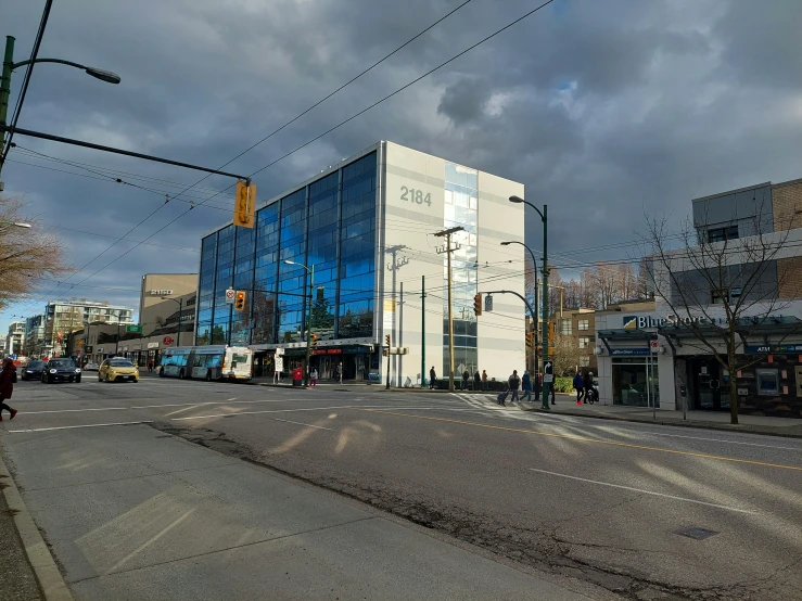 an empty city street on a cloudy day