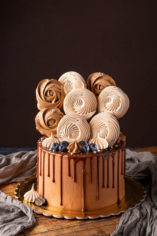 a cake decorated with chocolate icing and roses