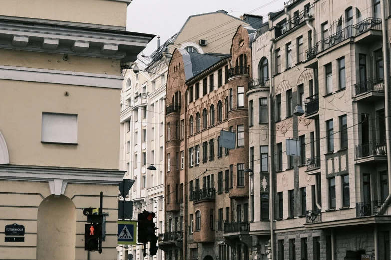 a city street lined with lots of tall buildings