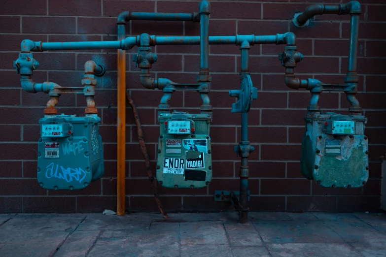 the pipes and electrical wires are attached to the wall