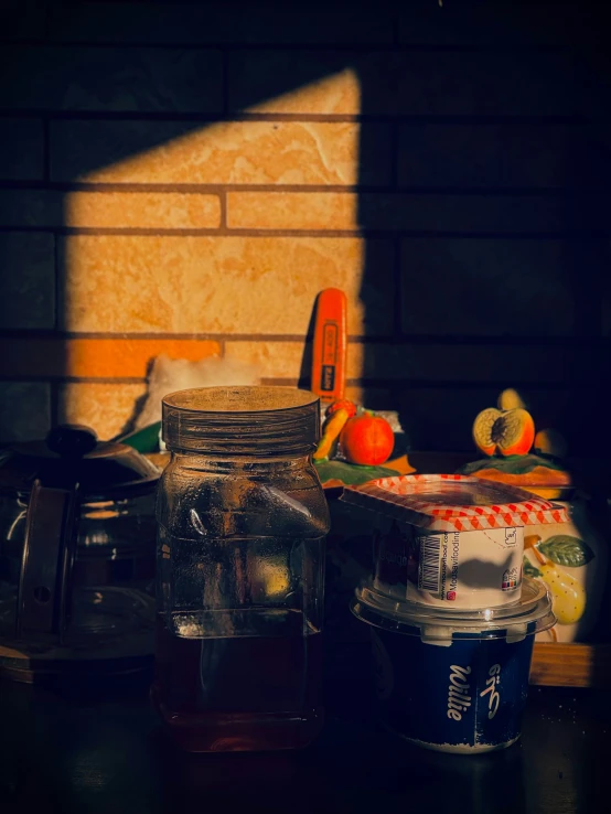 a blender full of ice water, fruit and a juicer