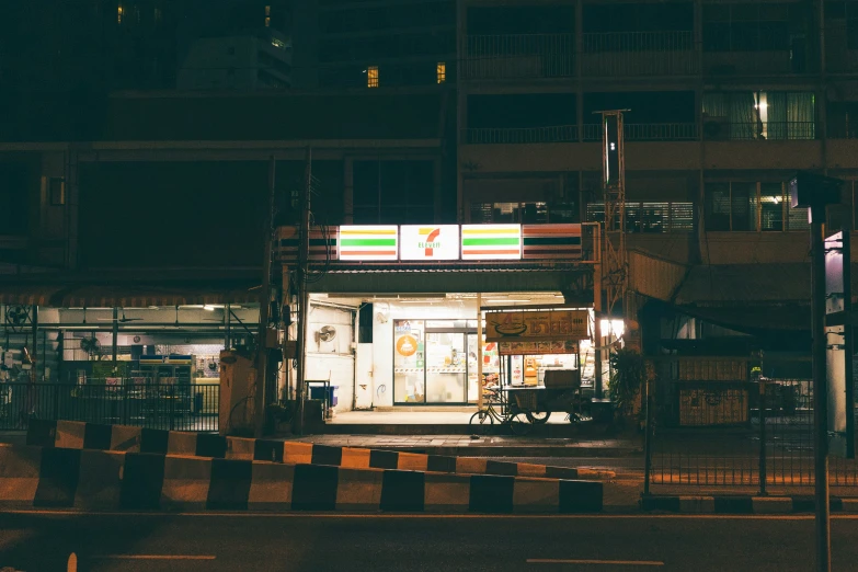 the street at night has some lights on